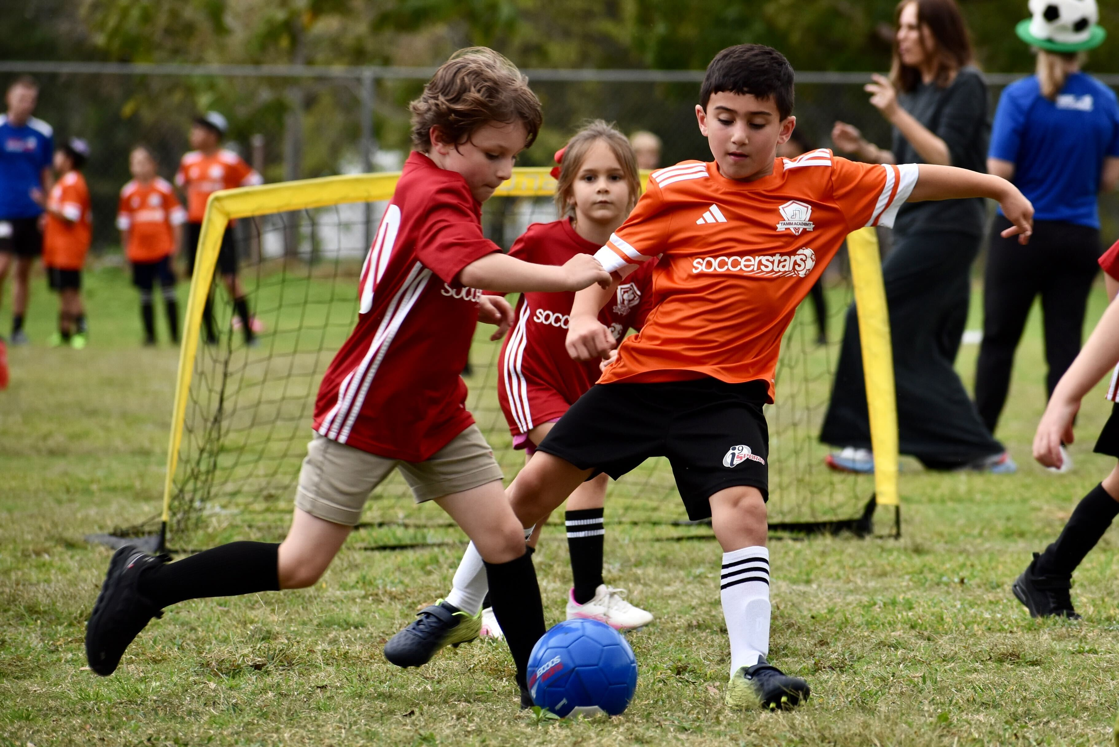 Children playing in a soccer game